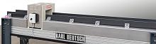 Tunnel demagnetizer for toolsconveyor belt