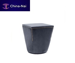 Contemporary pouf In Betweenfabricleathersquare