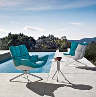 Contemporary fireside chair Huskfabricaluminumplastic