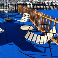 Contemporary chair Rockyoutdoorwoodenpowder-coated steel base