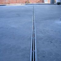 Drainage channel with central slot ULTRASLOTgalvanised steel gratefor public spacesfor airport