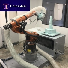 Robotic milling cell for machining centers