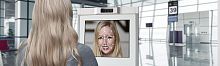 Facial recognition scanner with card reader for airport