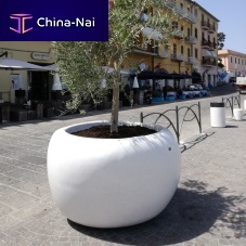 Fiber-reinforced concrete planter NUVOLAhigh-performance concretecircularcontemporary