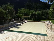 Automatic swimming pool cover security