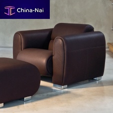 Contemporary club chair sumoleatherwith footrestbrown