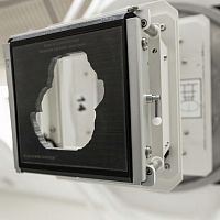 Radiosurgery system multileaf collimator ECUTOUT for radiation therapy systems