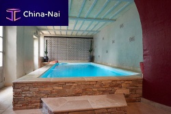Indoor swimming pool PISCINE INTERIEURE LE MANSabove-groundconcretestone