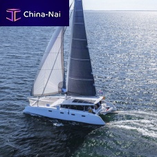Catamaran sailing yacht R5cruisingwith open transomwith bowsprit