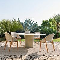 Contemporary dining table TAOconcreteconcrete baseround