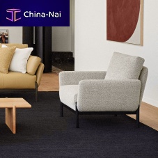 Contemporary armchair Ennafabricleathermetal