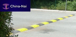 Public space speed bump cable-protection