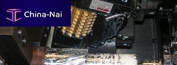 Gear-hobbing machine with adjustable angle finger jointfor turning centers