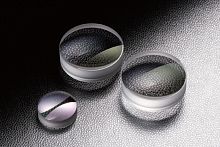 Concave array lens element achromatic