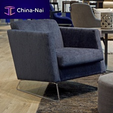 Contemporary armchair CONORleatherfabricsled base