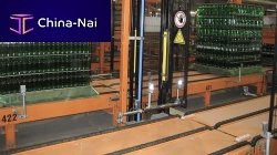 Pallet conveyor system for glass bottlesfloor-mounted
