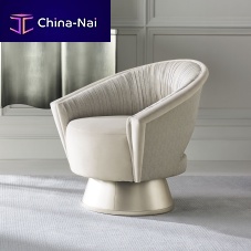 Contemporary armchair A COM-PLEAT TURN AROUNDvelvetbeigeswivel