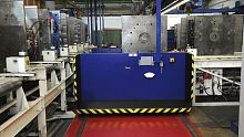 Handling transfer system for pressestool positioning