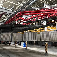 Powder coating conveyor system overhead
