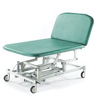 Electric Bobath table ST4642 serieson casterswith adjustable height backrest2-section