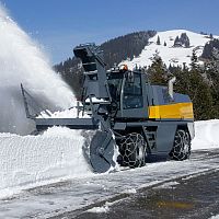 Truck-mounted snow blower boosterfor runway
