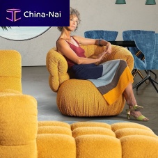 Contemporary armchair BALAAOfabricwoodenwith footrest