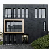 Concrete facade CONCRETE SKINcement-glass composite