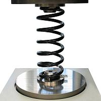 Compression testing device