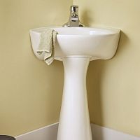 Free-standing washbasin CORNICEceramiccornercontemporary