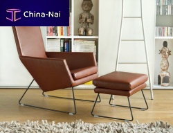 Contemporary armchair DONleatherwith footrestsled base