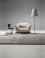 Contemporary armchair KANAHAleatherfabriciron