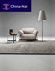Contemporary armchair KANAHAleatherfabriciron
