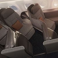 Aircraft cabin seat VantageSOLObusiness classwith tablewith adjustable headrest