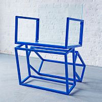 Original design chair MONOLITH indoorpolished stainless steelsled base