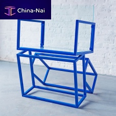 Original design chair MONOLITH indoorpolished stainless steelsled base