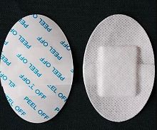 Non-woven wound dressing absorbant