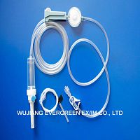 IV infusion set with particle contamination filter