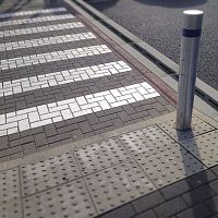 Slot drainage channel SAFETICURBconcretemetal gratefor parking lot
