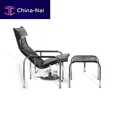 Contemporary armchair Eichenbergerleatherchromewith footrest