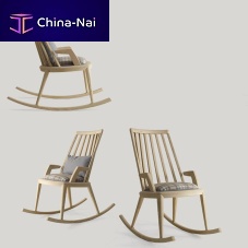 Contemporary armchair BESS fabricsolid woodrocking