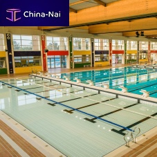 Swimming pool movable floor