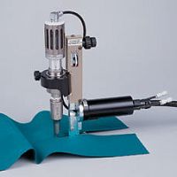Ultrasonic cutting machine SureCuttextilelabelhand-held